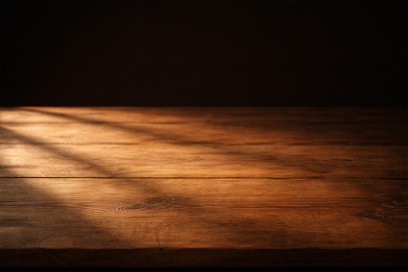 Wooden Table Mockup with Dramatic Side Lighting and Long Shadows – Free Download