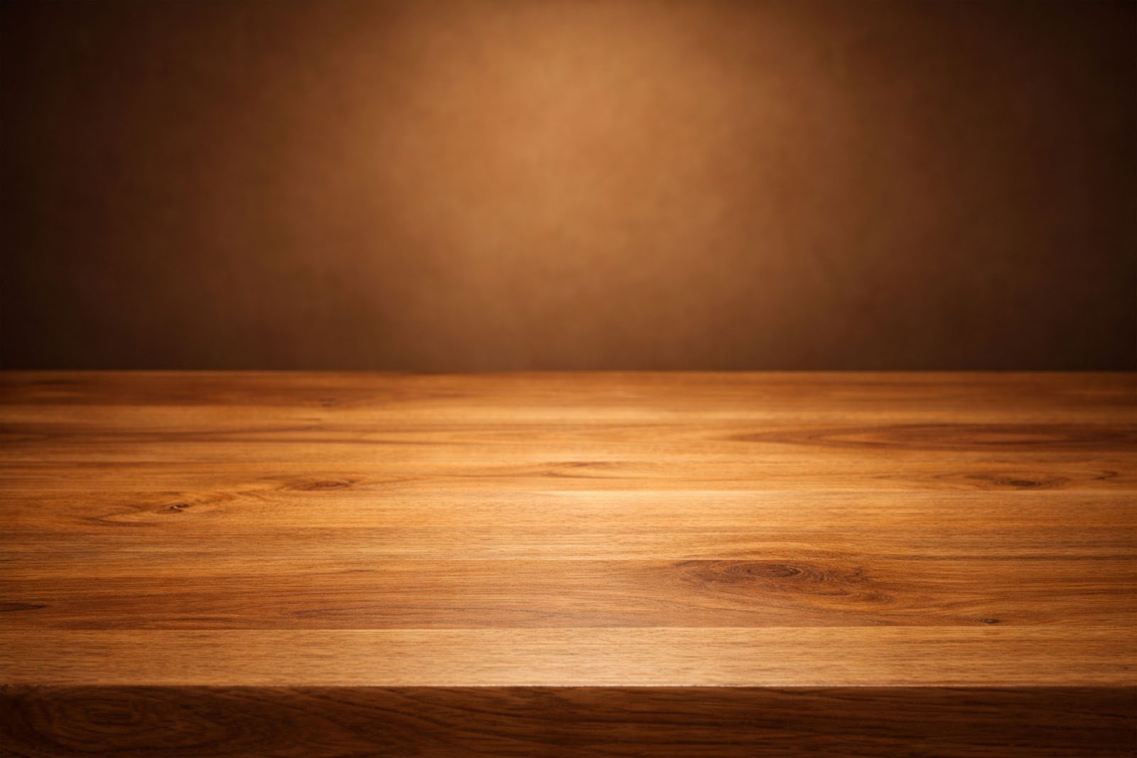 Wooden Table Mockup with Warm Center Spotlight – Perfect for Product Display PNG