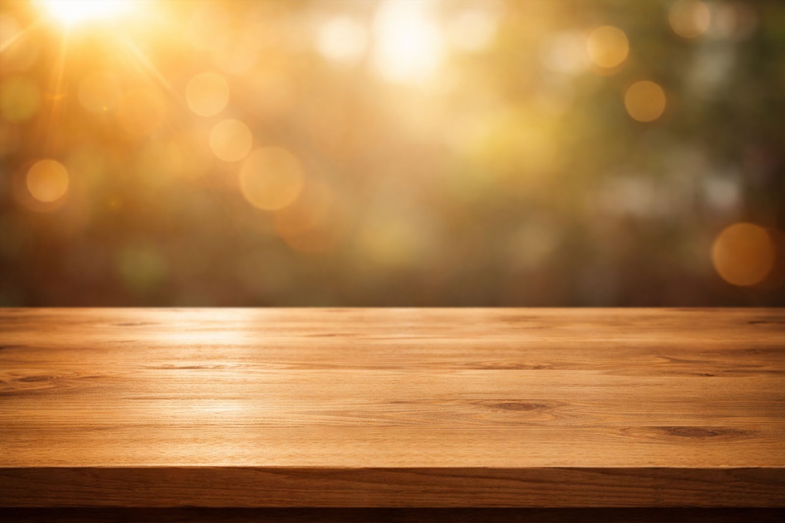 Wooden Table Mockup with Light Leaks and Warm Flares – High Resolution Product Display Background Download