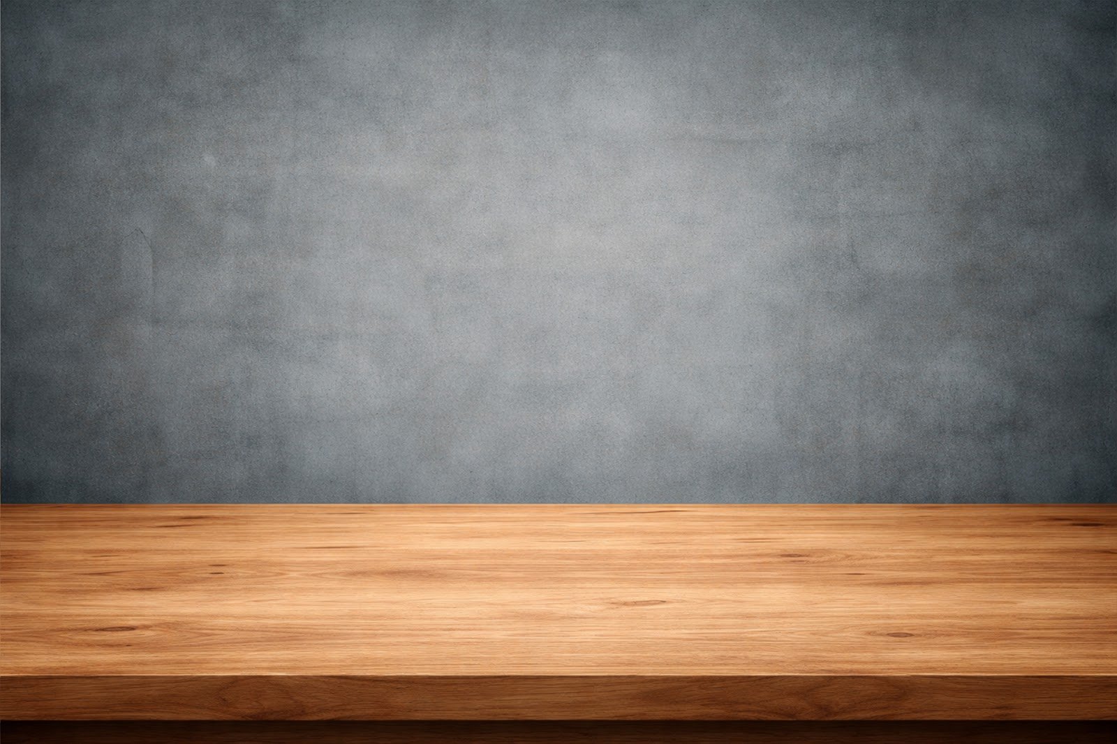 Wooden Table Mockup with Cool-Toned Industrial Wall Background – High Resolution Product Display Download