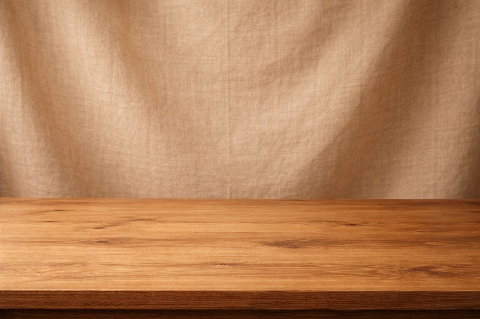 Wooden Table Mockup with Warm Linen Fabric Backdrop – High Resolution Product Display Download
